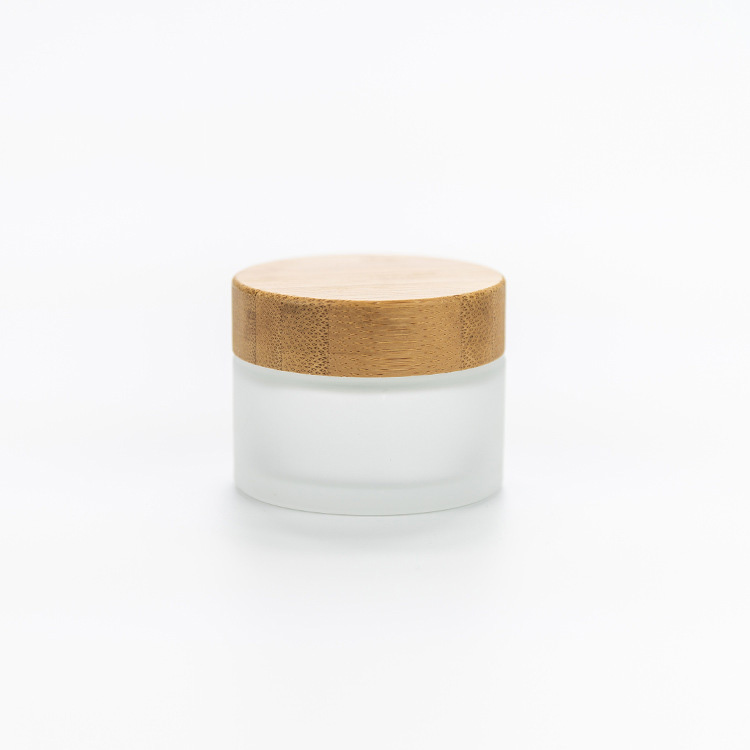 Wholesale cosmetic 30ml 50ml frosted bamboo glass jar for cosmetic cream