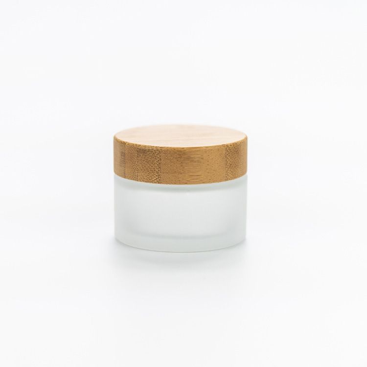Wholesale cosmetic 30ml 50ml frosted bamboo glass jar for cosmetic cream
