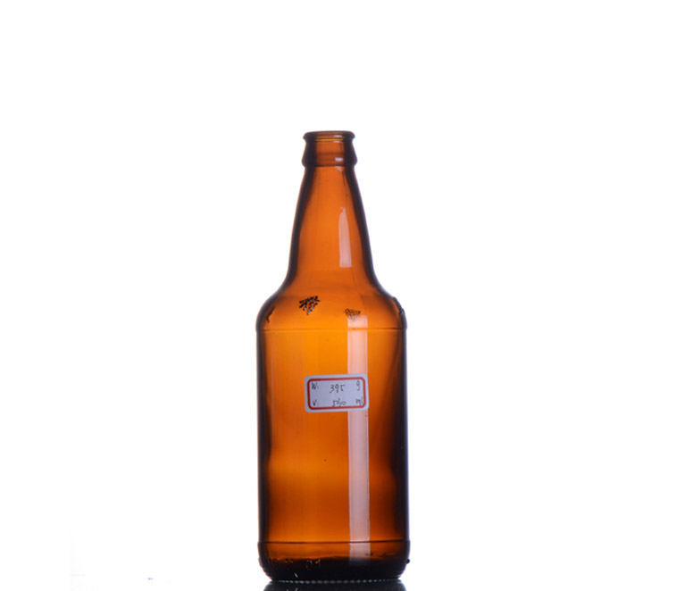 Glass beer bottle with crown cap